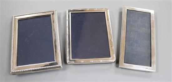 An Edwardian silver mounted photograph frame, Birmingham, 1905 and two later silver mounted photograph frames.